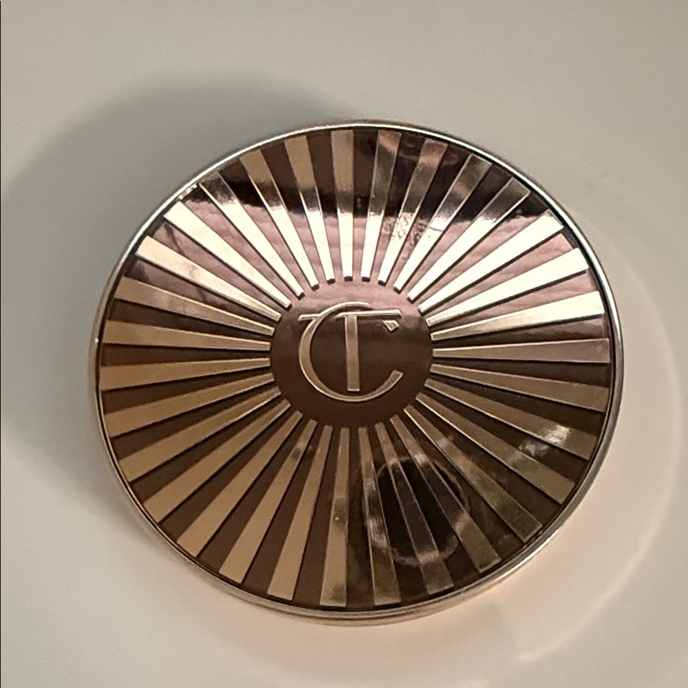 Charlotte Tilbury Metallic Rose-Gold Sunburst Compact